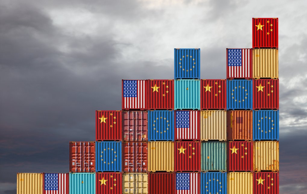 Stack of freight containers bearing different national flags